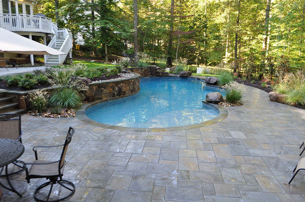 Custom-In-ground-Pool-Paving-Stone-Pool-Deck-Annapolis Battle of Pool Deck Materials: Pros and Cons