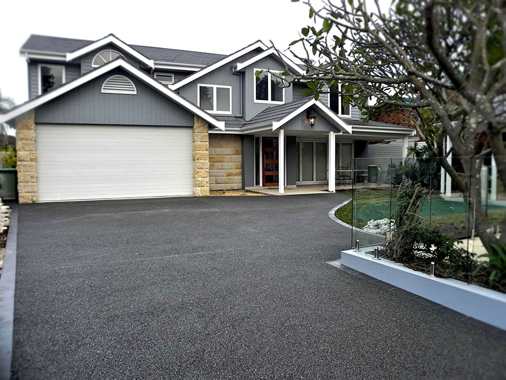 Modern-gray-house-with-a-matching-driveway- 5 Easy Tips For The Perfect Driveway