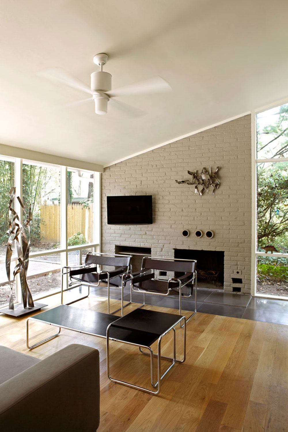 Mid-Century-Mod-re-do-by-KUBE-architecture How to decorate a room with floor to ceiling windows