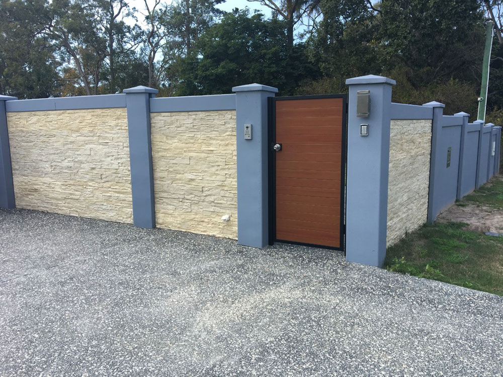 Stacked-Stone-Boundary-Walls-by-SUPERIOR-CONCRETE-WALLS Fence styles and designs that you can surround your house with