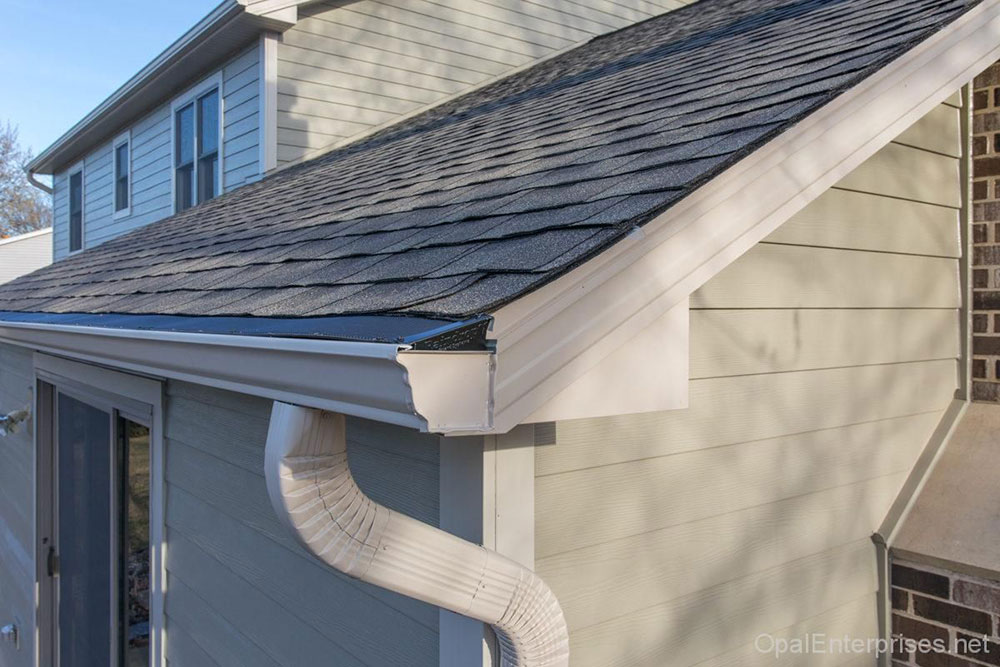 Check-the-gutters-constantly How long do asphalt shingles last and when you should change them