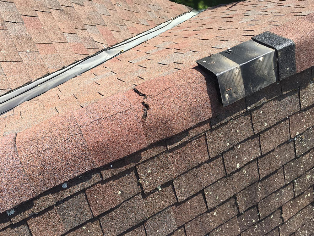 cracked How long do asphalt shingles last and when you should change them