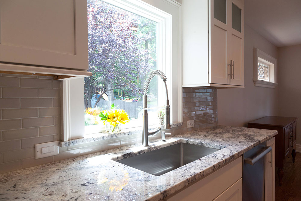 Beautiful-Garden-View-from-Kitchen-by-KraftMaster-Renovations What is the standard countertop overhang? (Answered)