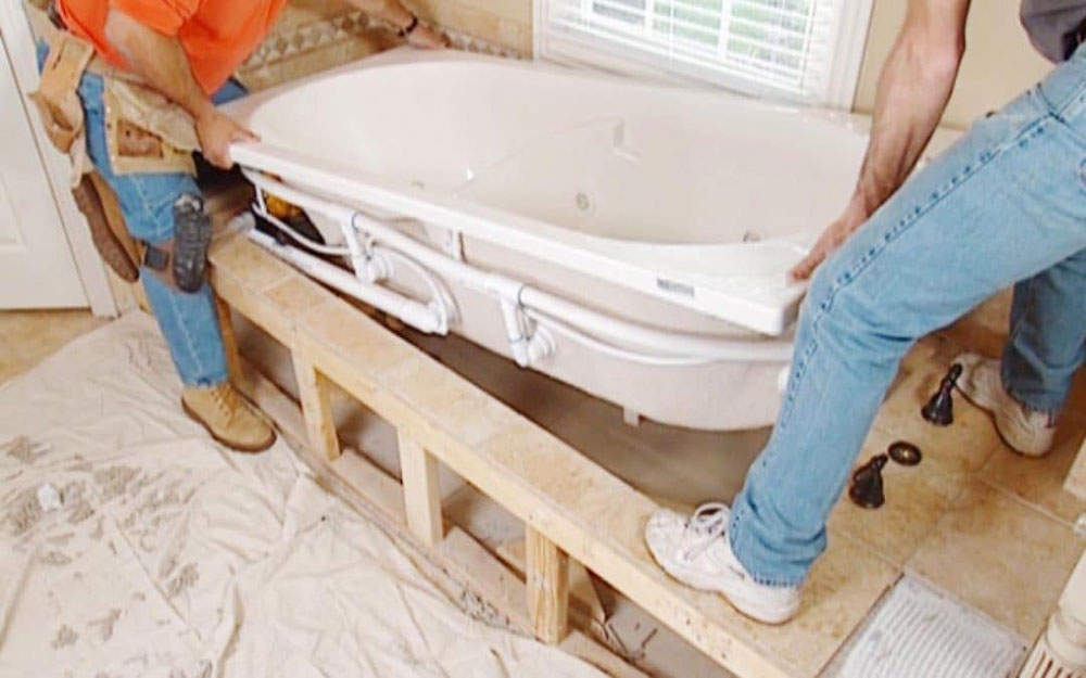 wooden-frame How to install a bathtub properly and with no stress