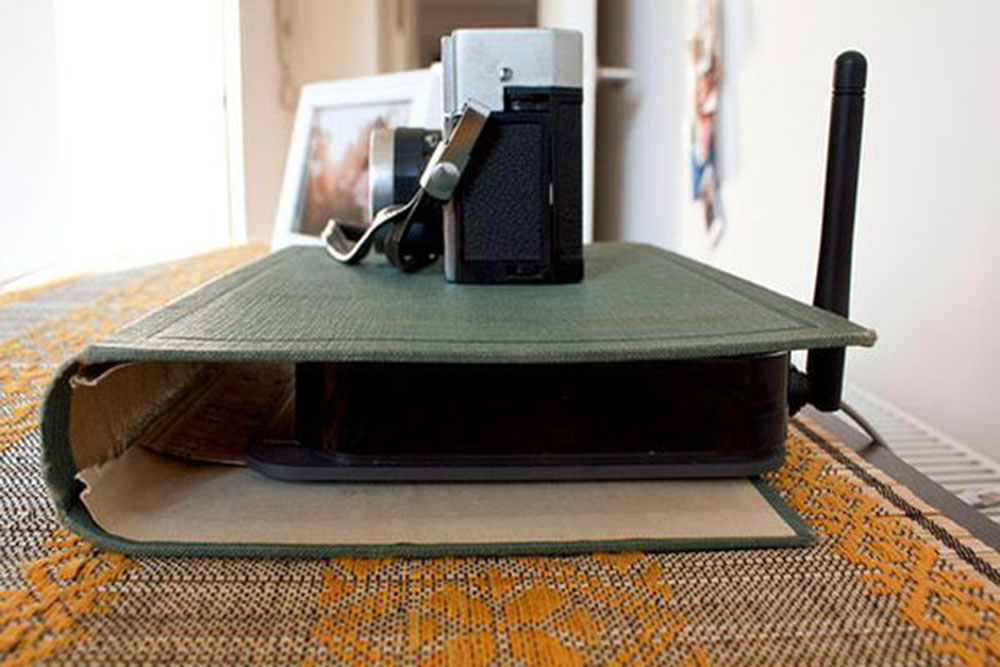 Stash-Wires-into-a-Book How to hide electrical cords in the living room (Quick tips)