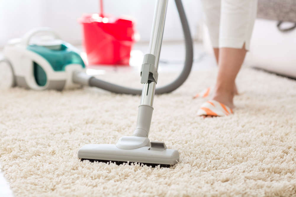 carpet-vaccum How to clean an area rug on hardwood floor (Great guide)