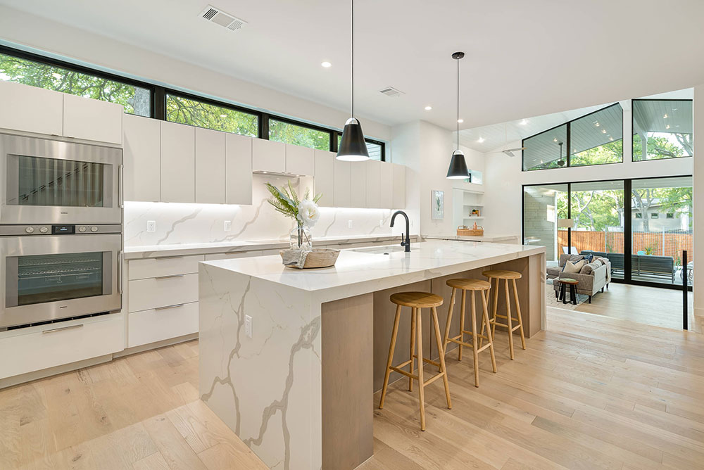 Cedarview-Residence-by-Root-Architecture How to use a waterfall countertop to make an awesome kitchen