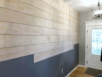 Should you put shiplap over drywall?
