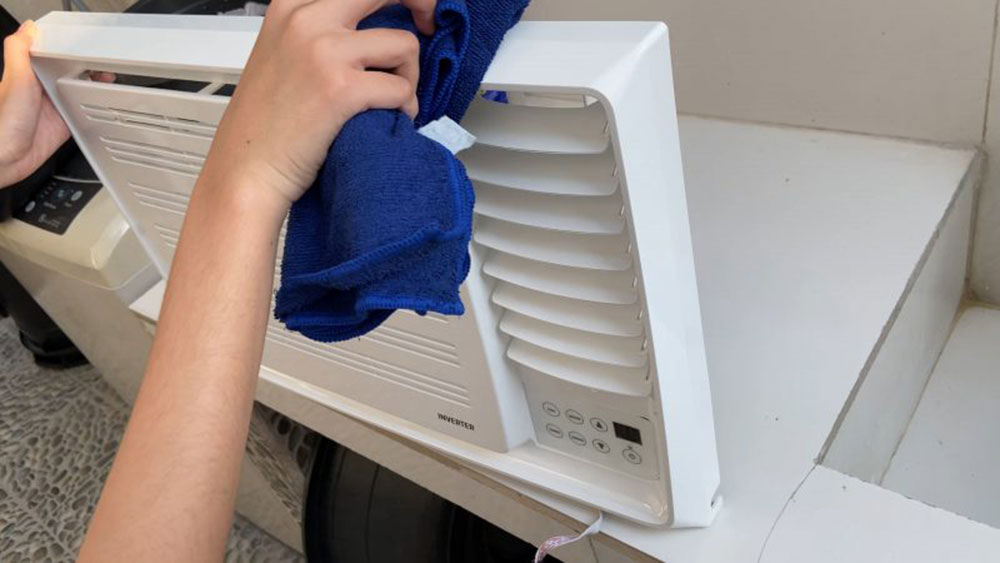 Dry-wipe How to Clean a Window Air Conditioner Without Removing It (Answered)
