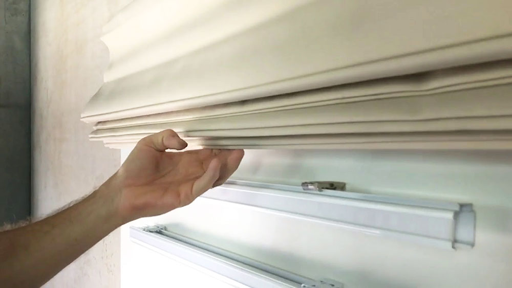 Remove-each-blade_roman-blinds How to Remove Blinds Easily and With Zero Hassle (Answered)