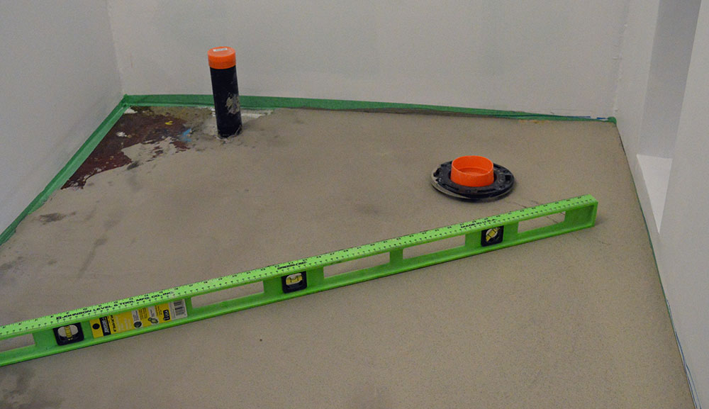 Mark-where-the-uneven-areas-are How to level a concrete floor that slopes (Must read)