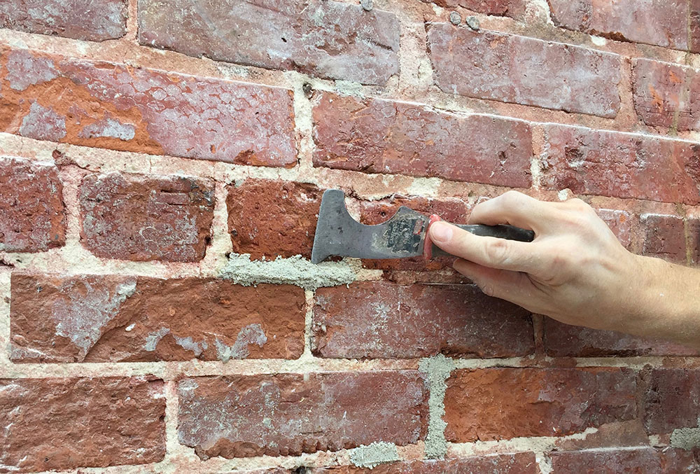 Remove-loose-paint-1 How to whitewash brick exterior (Tips and tricks to follow)