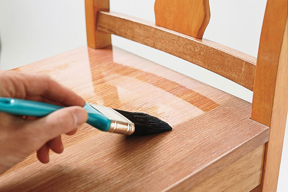 Applying-the-paint-stripper How to remove polyurethane from wood (The easiest way)