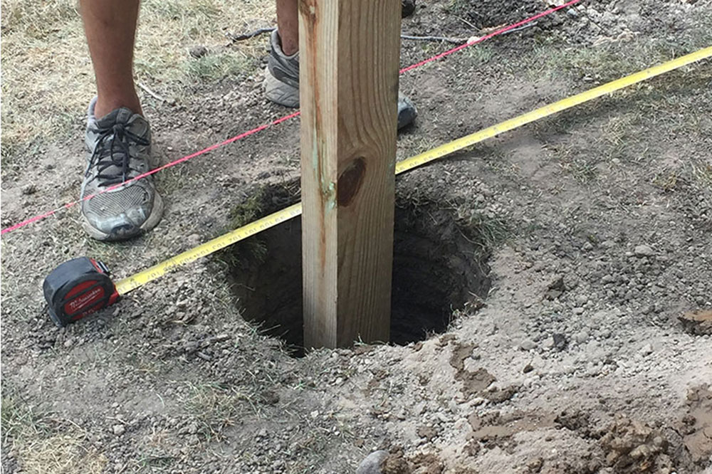 Fence-Post-Holes How to level fence posts quickly and efficiently