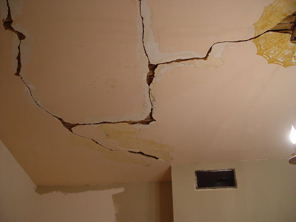 Large-cracks-and-a-bowed-ceiling What Causes Cracks in Ceilings and How to Fix Them (Answered)