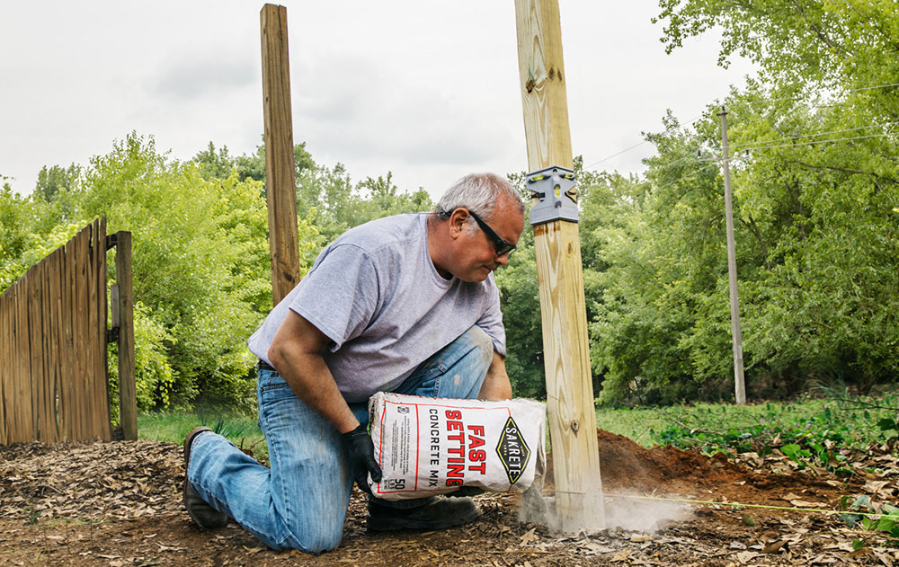Pouring-the-concrete How to install a fence post with zero hassle