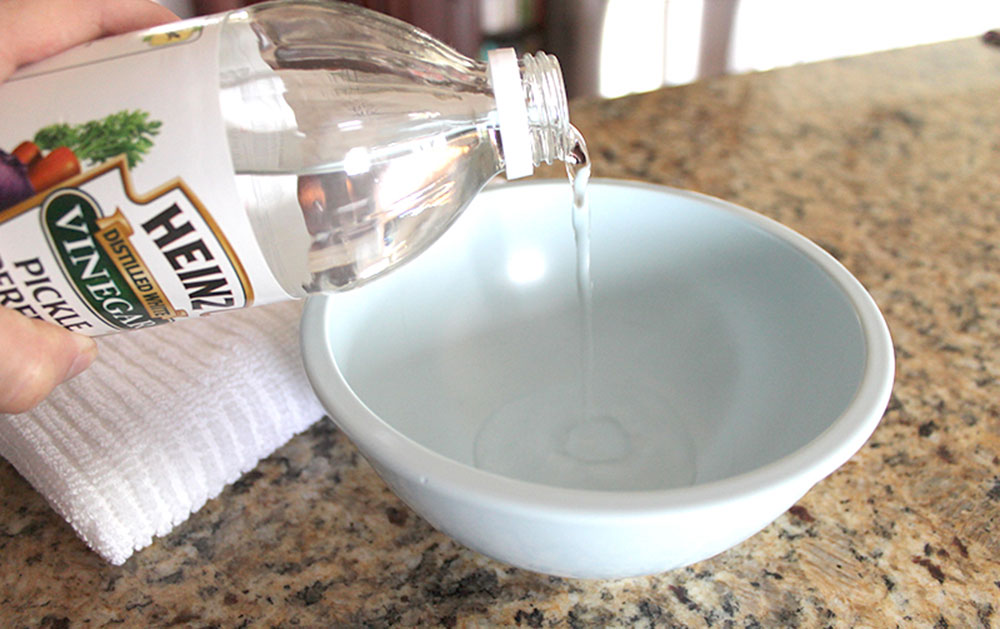Set-out-bowls-of-Vinegar How to get rid of paint smell in a room quickly