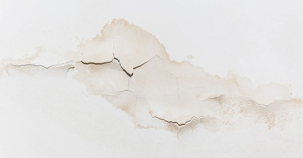 discolored-cracks What Causes Cracks in Ceilings and How to Fix Them (Answered)
