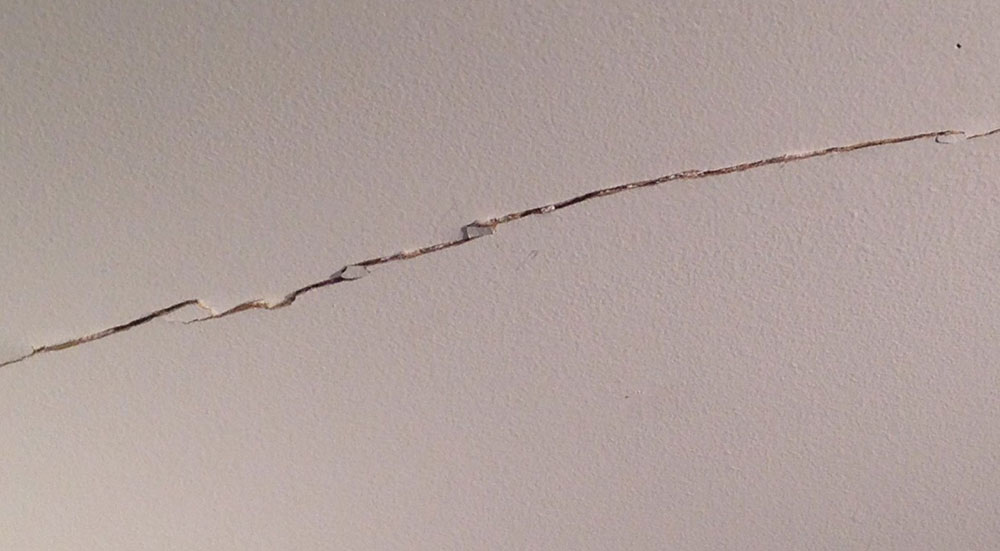 straight-crack What Causes Cracks in Ceilings and How to Fix Them (Answered)