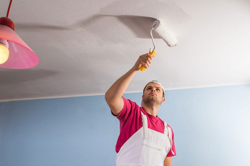 Paints-in-popcorn-ceilings What kind of paint do you use on a popcorn ceiling?