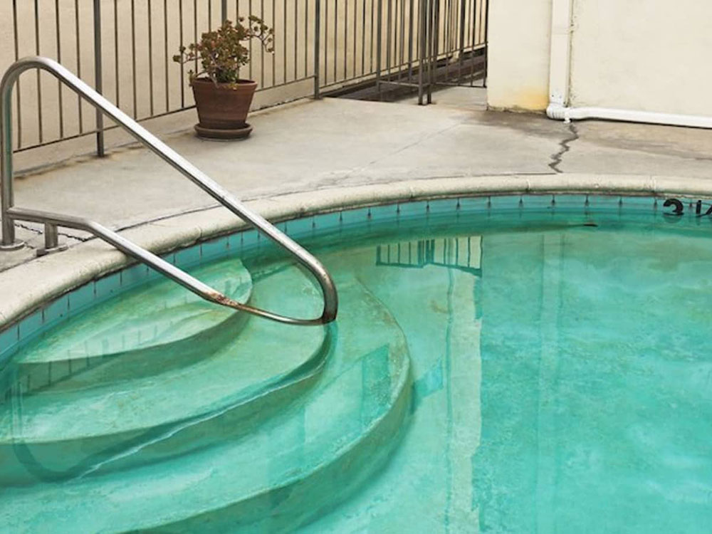 Pool-Discoloration How to repair a crack in a concrete swimming pool