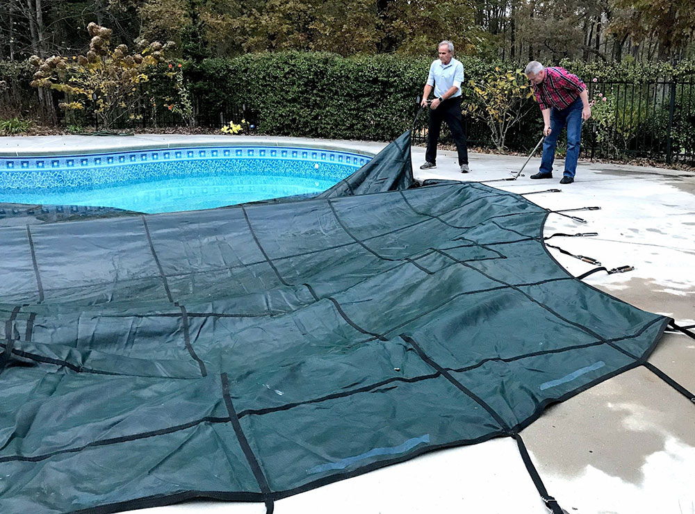Remove-Pool-Cover How to clean a swimming pool after winter