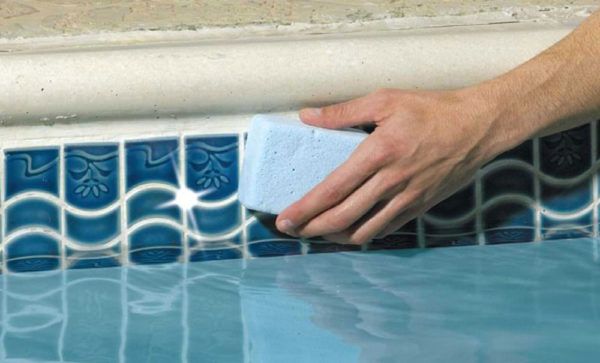 How to remove calcium deposits from swimming pool tiles