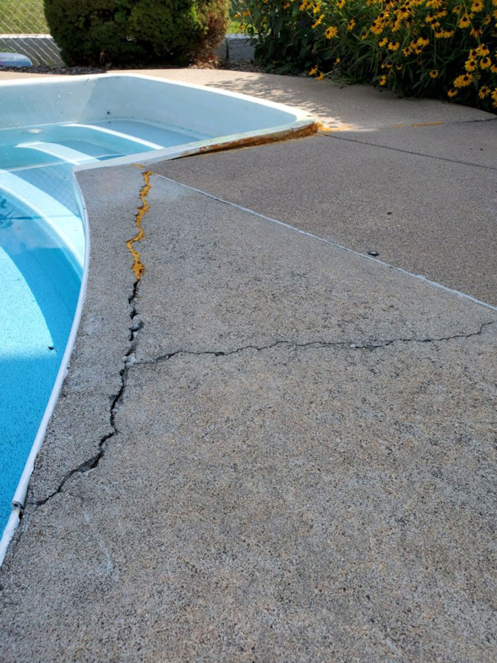 Surface-pool-cracks How to repair a crack in a concrete swimming pool