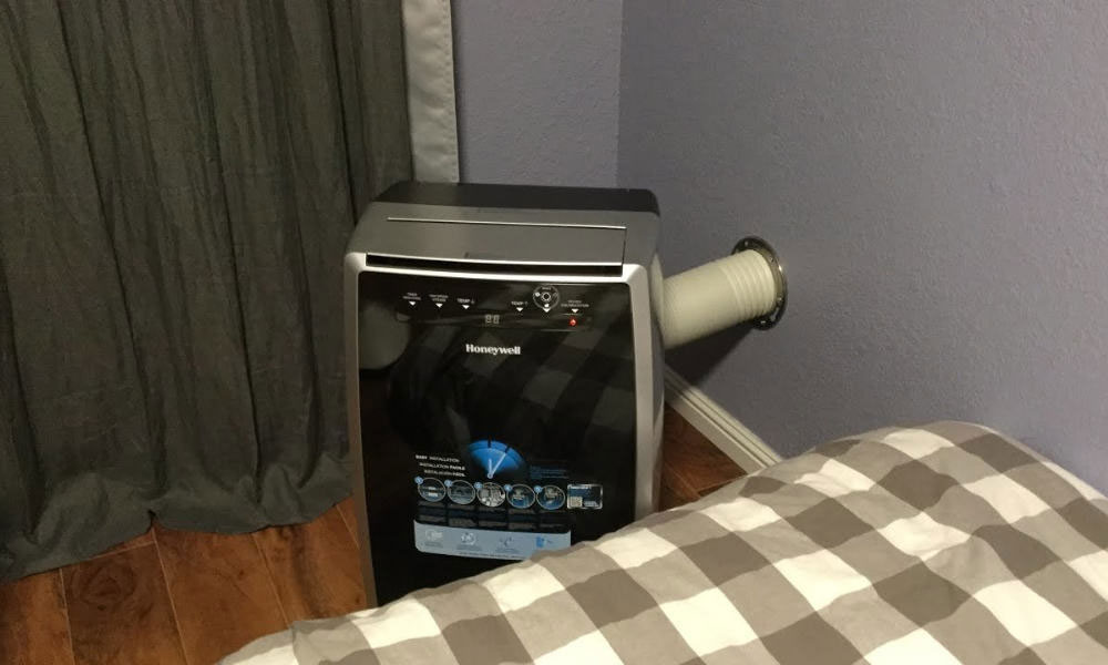 Vent-a-portable-AC-unit-through-a-nearby-wall How to vent a portable air conditioner without a window