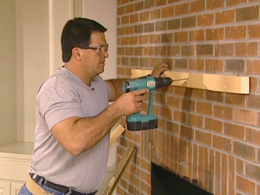 Drill-the-holes How to install a fireplace door easily today