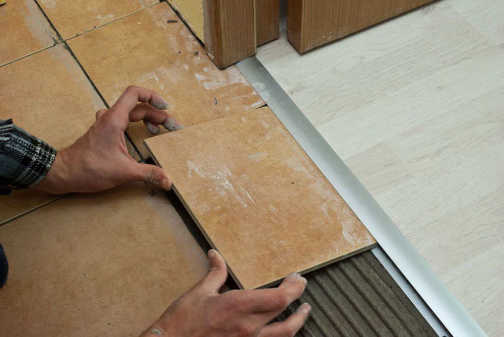 Tile-to-Laminate-Transition How to install laminate flooring without transitions