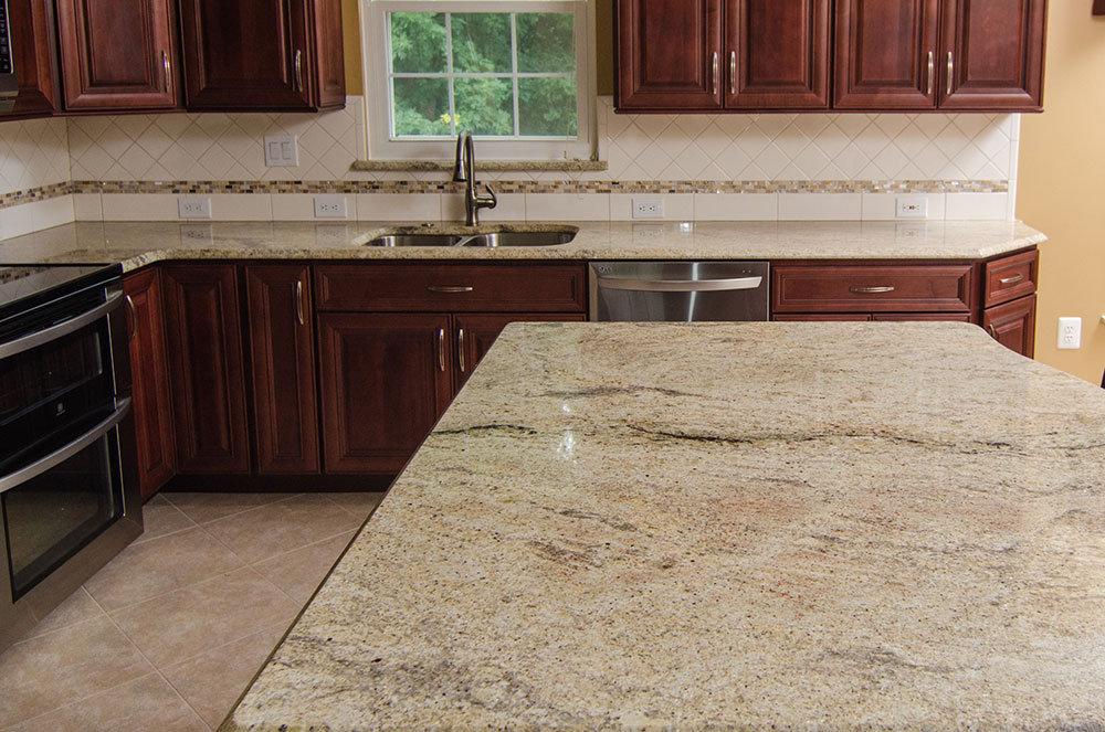 Cream-Colored-Granite The Most Interesting Kitchen Color Schemes with Cherry Cabinets