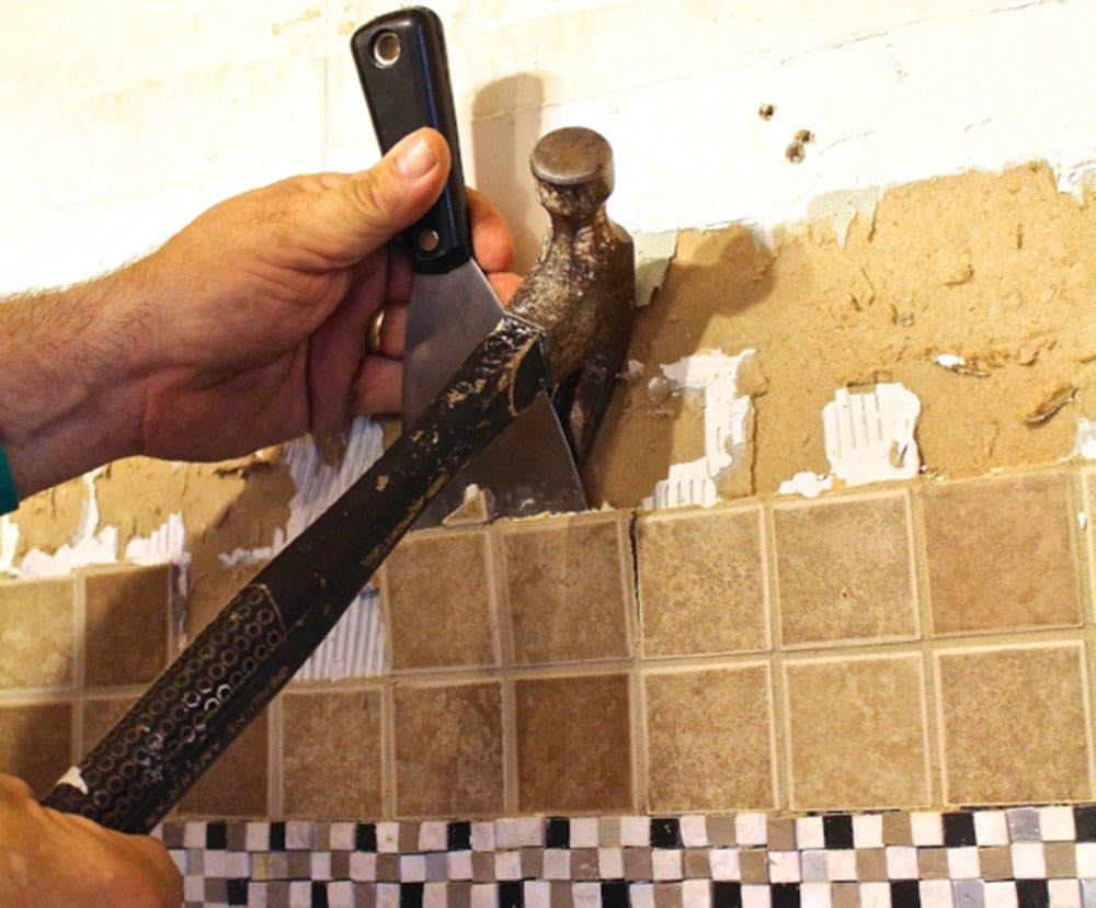 How-to-remove-backsplash-tile2 How Much Does Backsplash Cost? Quick Answer Inside