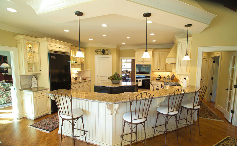 Large-open-kitchen-with-eat-at-bar-and-island-by-HOUCK-Residential-Designers Great Kitchen Color Schemes with White Cabinets