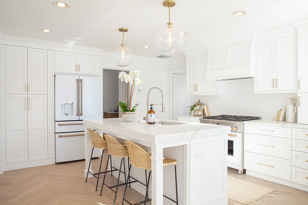 All-White-Transitional-Kitchen-with-Herringbone-Wood-Floor-by-Showcase-Kitchens-1 What Color Light Is Best for The Kitchen? (Answered)