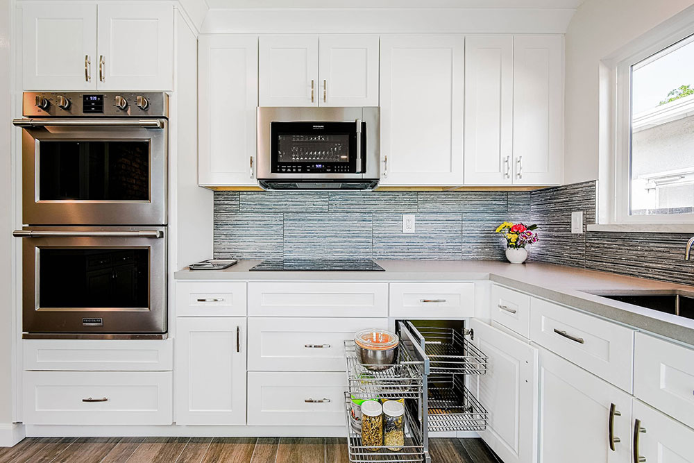 Big-open-concept-by-Visionary-Home-Remodeling-Inc. How To Organize A Corner Kitchen Cabinet