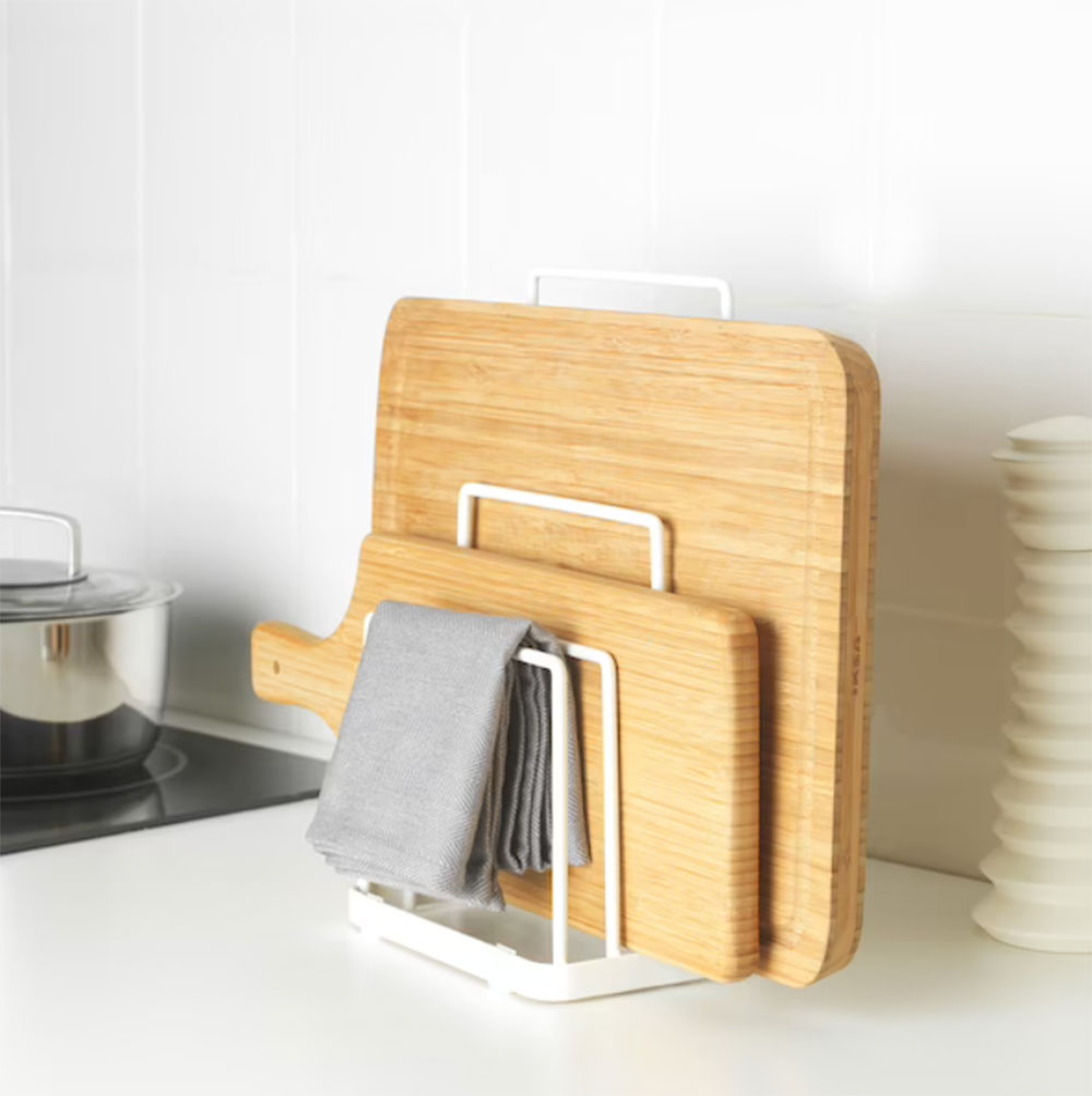 Use-It-to-Cover-Electrical-Outlet How to Display Cutting Boards on a Kitchen Counter