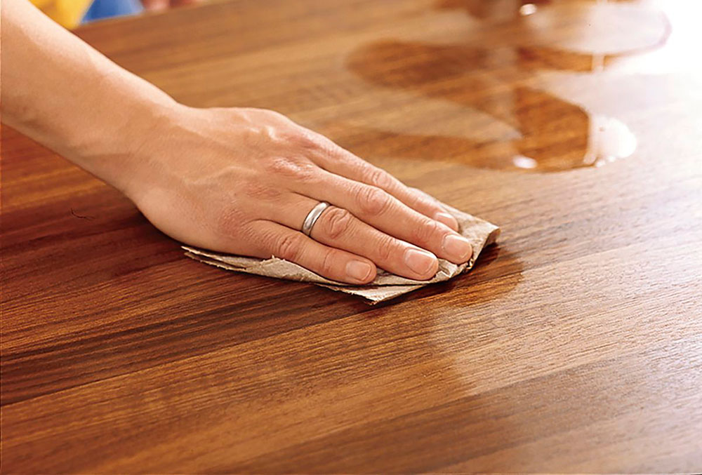 water-spill How to Clean Sticky Wood Kitchen Cabinets