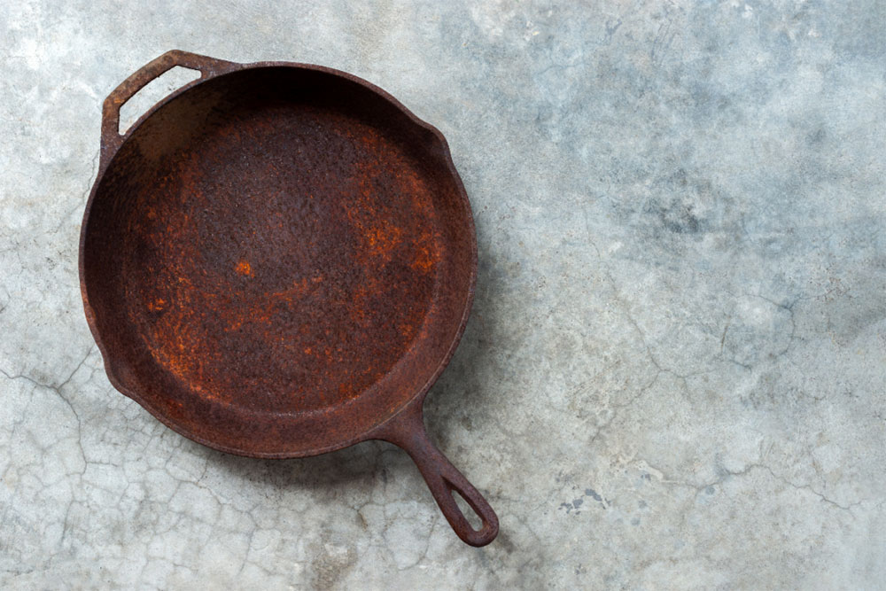 cast-iron-rusty How to Remove Rust from Kitchen Utensils