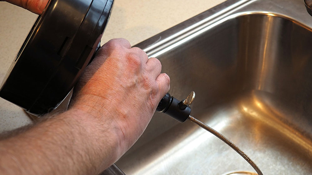 how-to-clear-a-clogged-kitchen-sink-drain How to Unclog a Double Kitchen Sink Easily